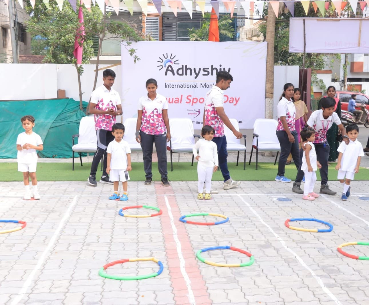 A Sportsa trainer working with school students