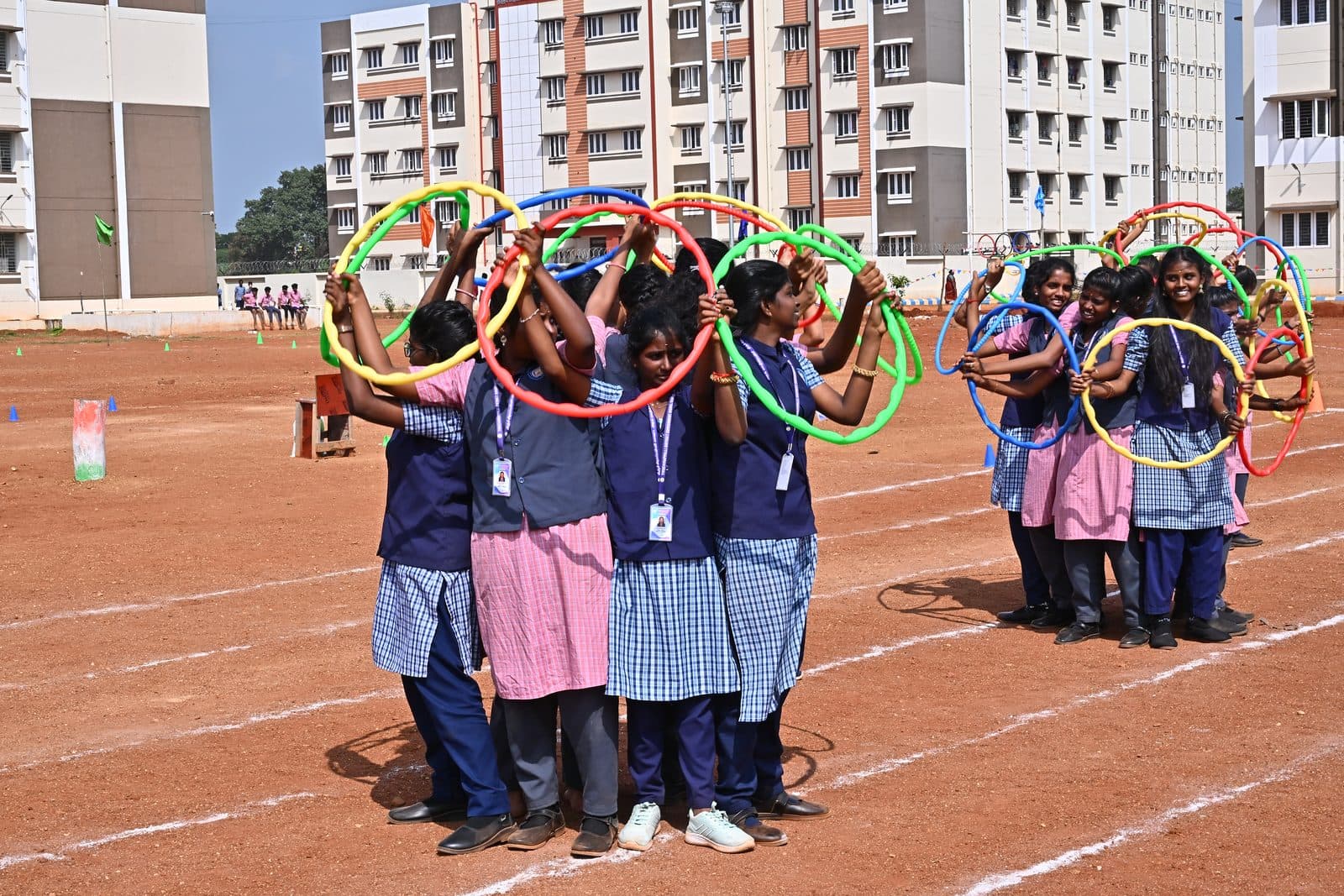 Students performing a hoop display at a school Sports Day