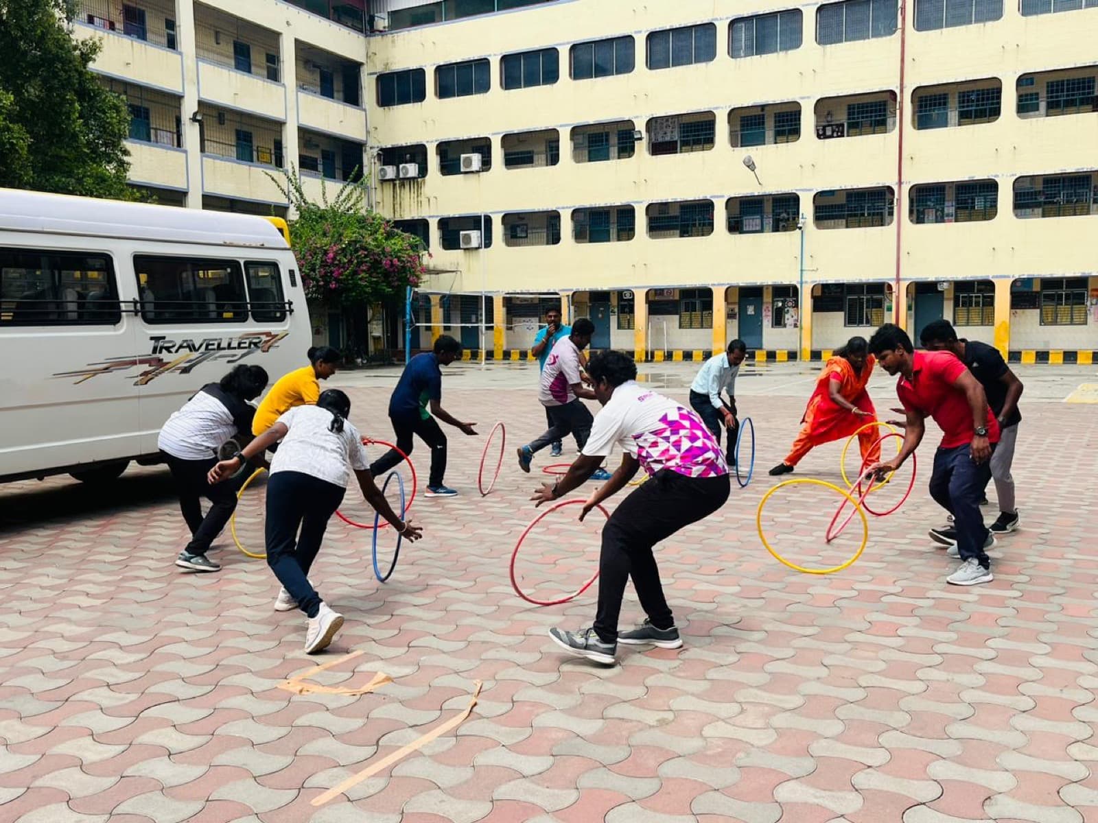 Sportsa Master Trainers delivering TPET on-the-job training to school PE teachers